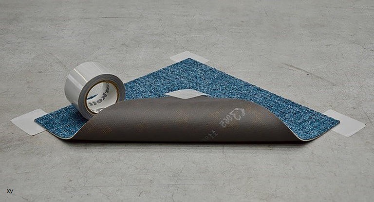 https://www.carpetcleaningforce.co.nz/wp-content/uploads/2023/06/Testing-the-carpet-tape-Adhesion.jpg