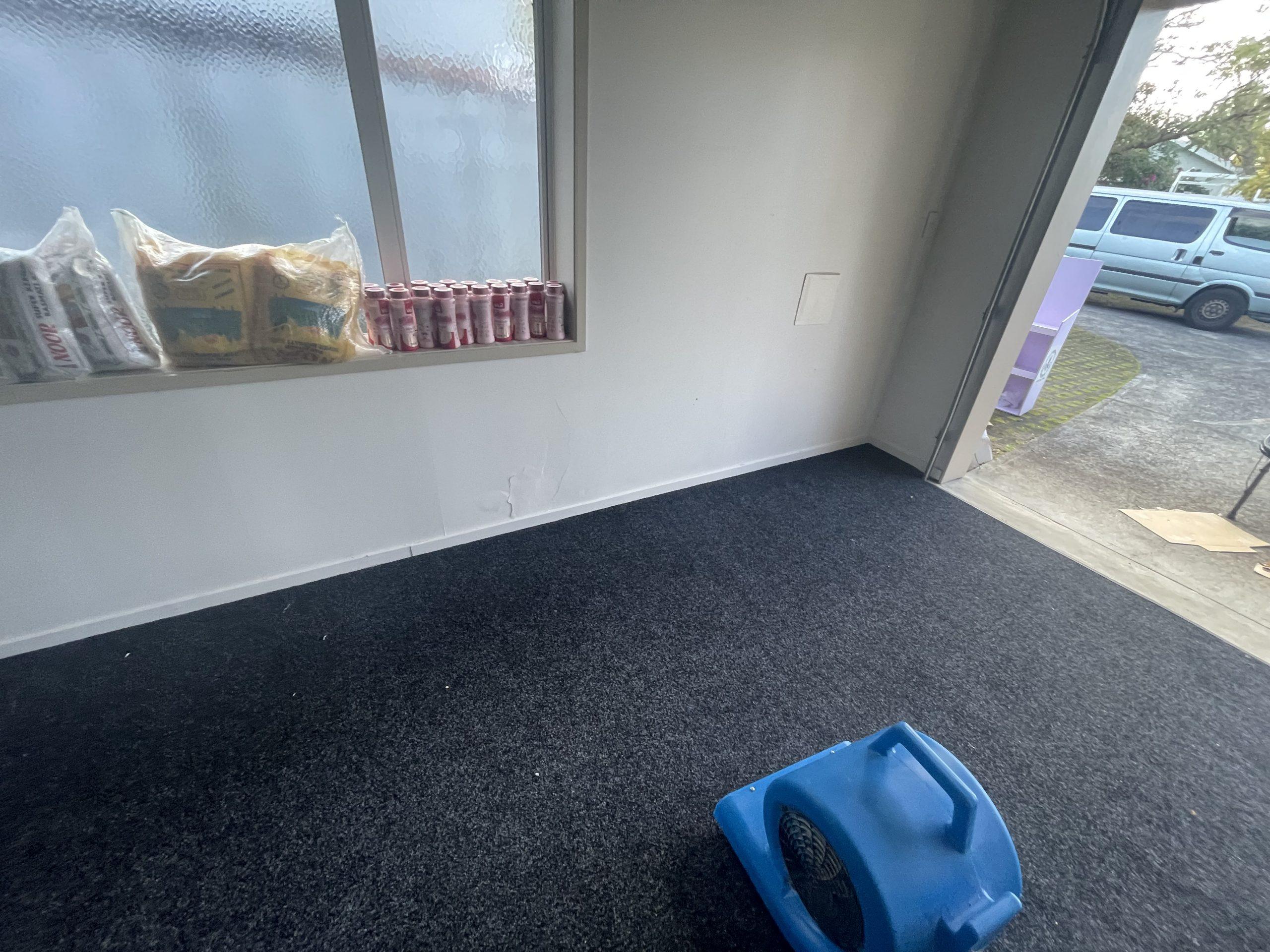 Targeted air mover in the garage during the final drying stage