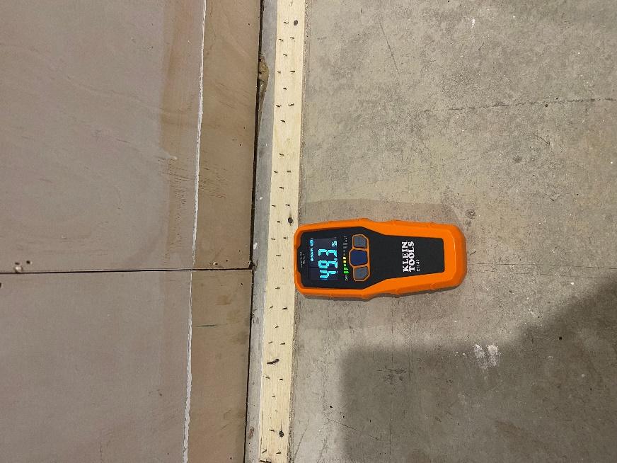 Final wall moisture reading used to verify drying progress